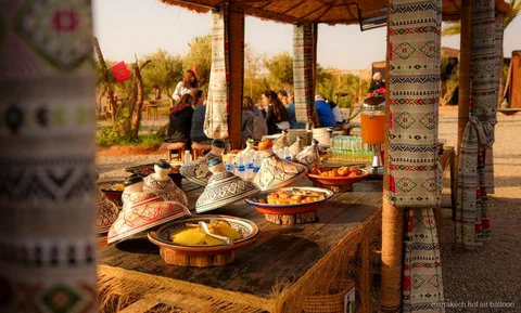 Passengers boarding the basket before a Marrakech sunrise balloon flight